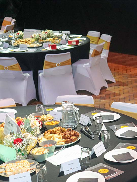 A photograph of food laid out on tables