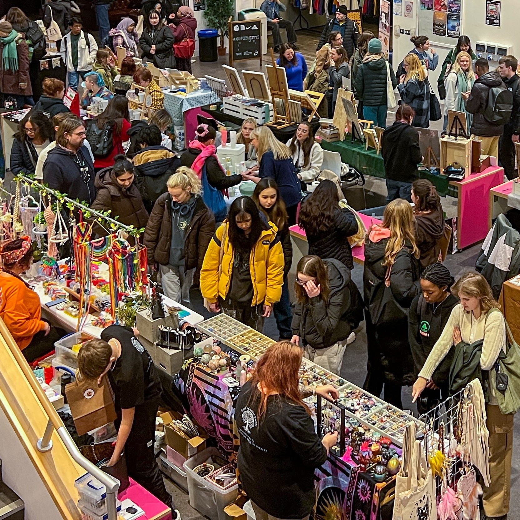 people gathered around stall