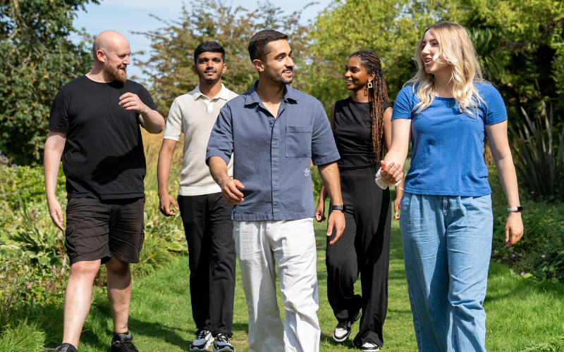 student officers walking on grass
