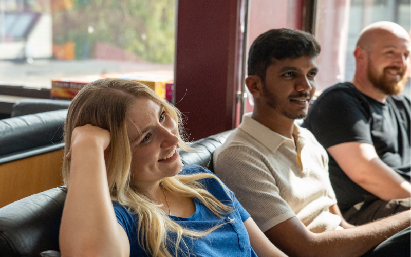 student officers talking on couch